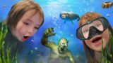 DOLPHiN RESCUE MiSSiON!! Adley & Niko explore the ocean to find Minecraft islands & Pirate Treasure!